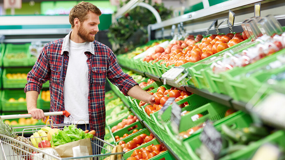 Young man in supermarket